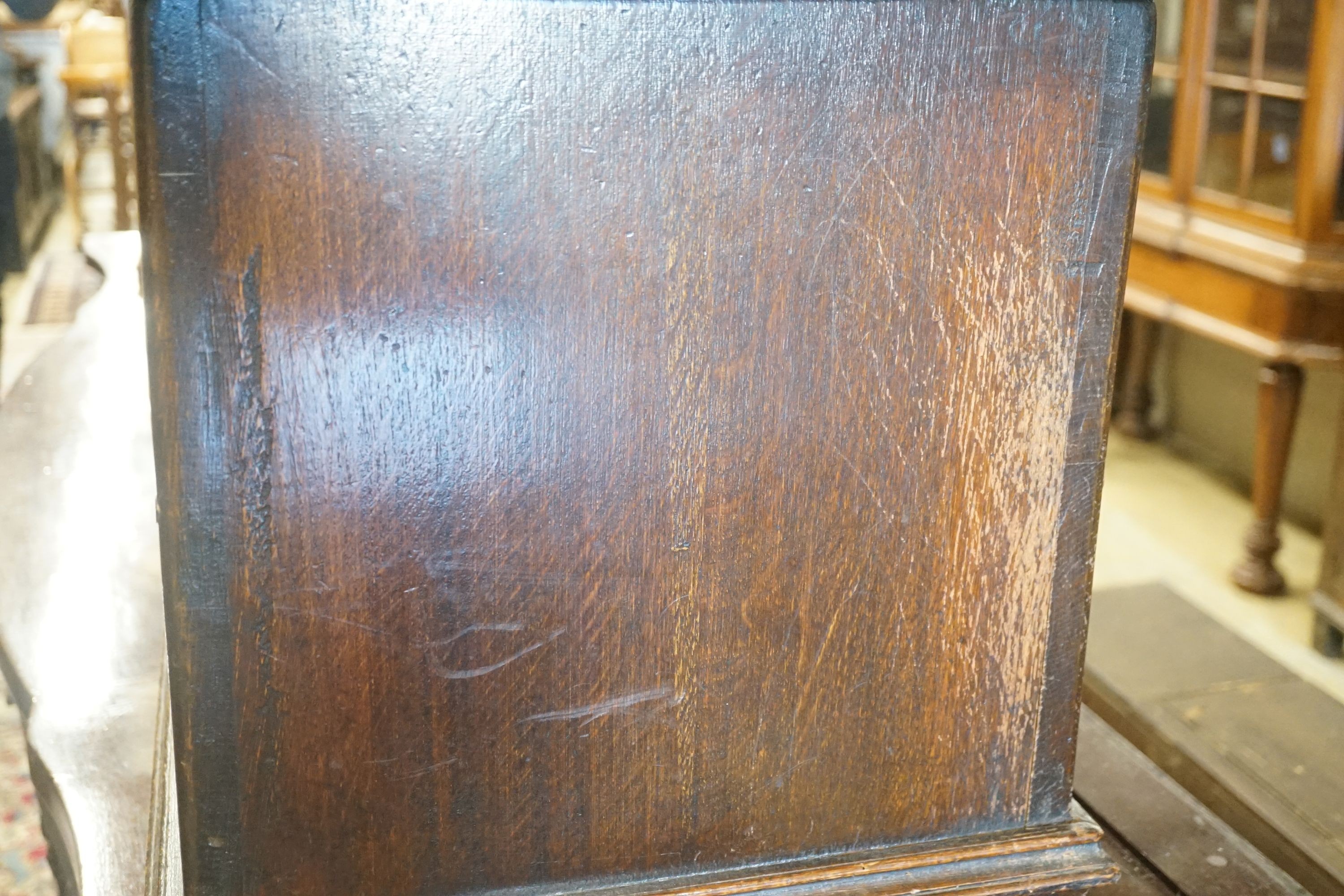 A small 17th century style carved country oak coffer, width 91cm depth 40cm height 47cm